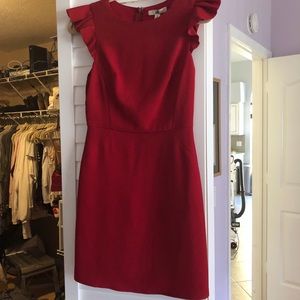 Dark red fitted dress with ruffle sleeves